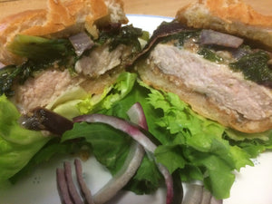 Rosemary and garlic breaded pork chop sandwich